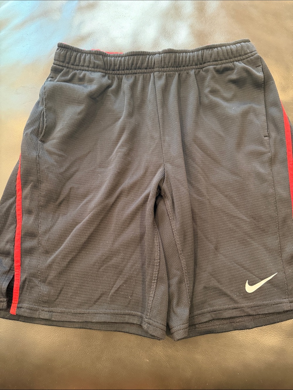 Nike Black Athletic Shorts with Red Side Stripes